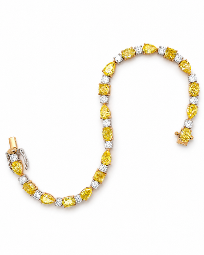 Fancy Vivid Yellow Diamond Tennis Bracelet in White Gold