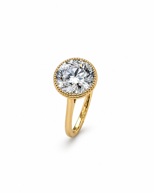 Round Brilliant Bezel Diamond Ring in Yellow Gold