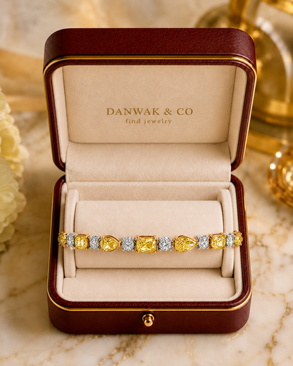 Fancy Vivid Yellow Diamond Tennis Bracelet in White Gold