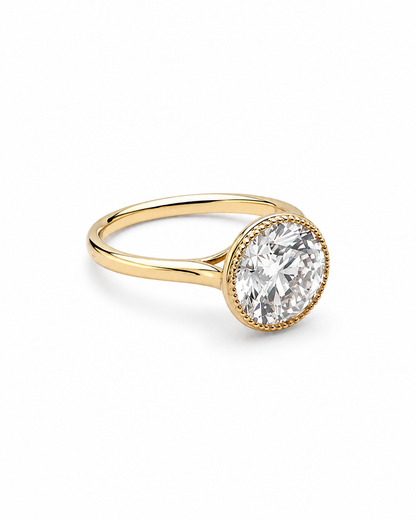 Round Brilliant Bezel Diamond Ring in Yellow Gold