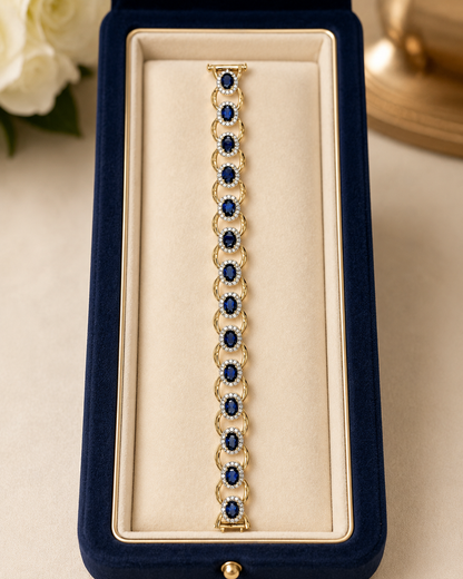 Oval Blue Sapphire & Diamond Halo Link Bracelet in Yellow Gold