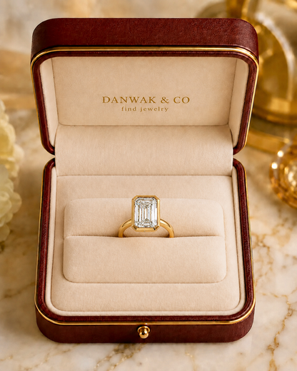 Emerald Cut Bezel Diamond Ring in Yellow Gold