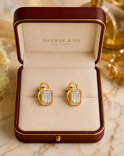 Emerald-Cut Diamond Stud Earrings in Yellow Gold Bezel Setting